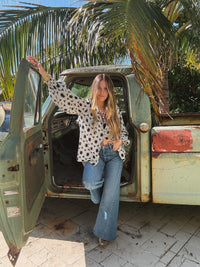 White floral retro wedding blouse by Lil Bee's Bohemian with button-up front, perfect for bridal or special occasion wear.