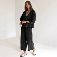 Women's Loran 2-piece cotton pajama set with V-neck top and matching pants, perfect for comfortable sleepwear.