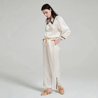 Loran women's contrast silk pajama set with long-sleeve top and matching pants, elegant sleepwear for comfortable nights.