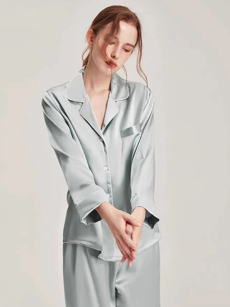 Loran women's silk pajama set with long sleeves in white, featuring a comfortable, elegant nightwear design.