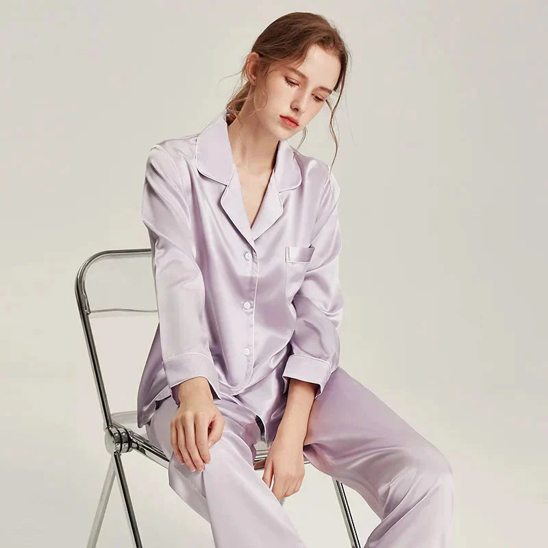 Loran women's long sleeve white silk pajama set, soft and elegant nightwear with smooth fabric and comfortable fit.