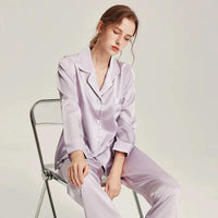 Loran women's long sleeve white silk pajama set, soft and elegant nightwear with smooth fabric and comfortable fit.