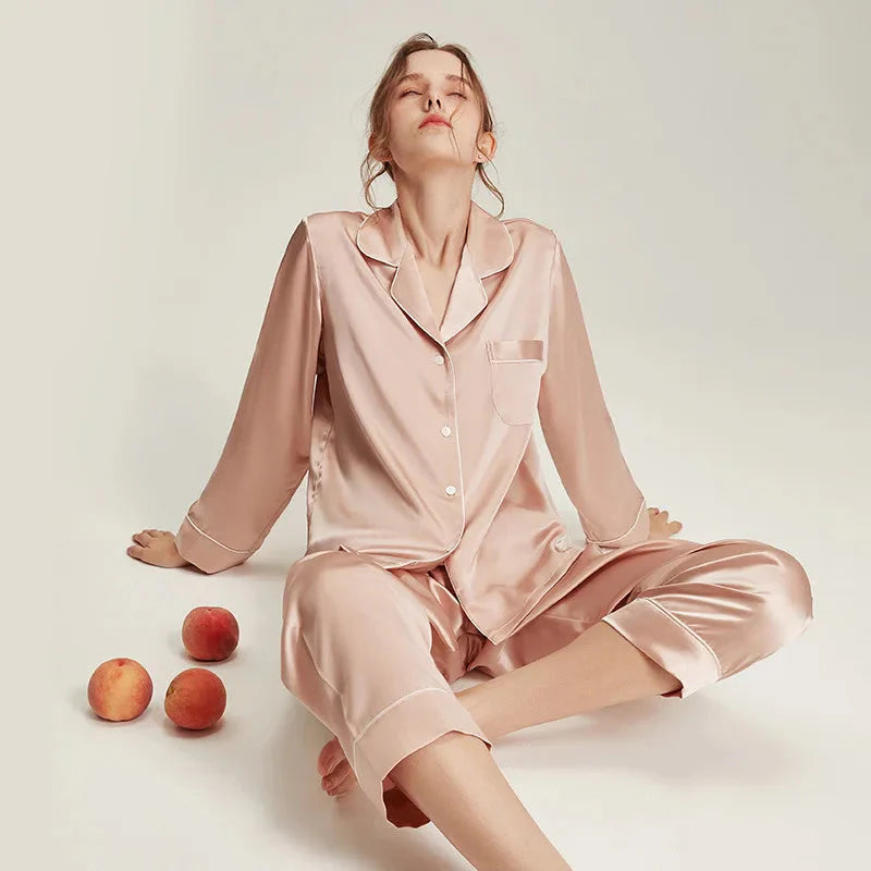 Loran women's long sleeve white silk pajama set, soft and elegant nightwear with comfortable fit and smooth fabric.
