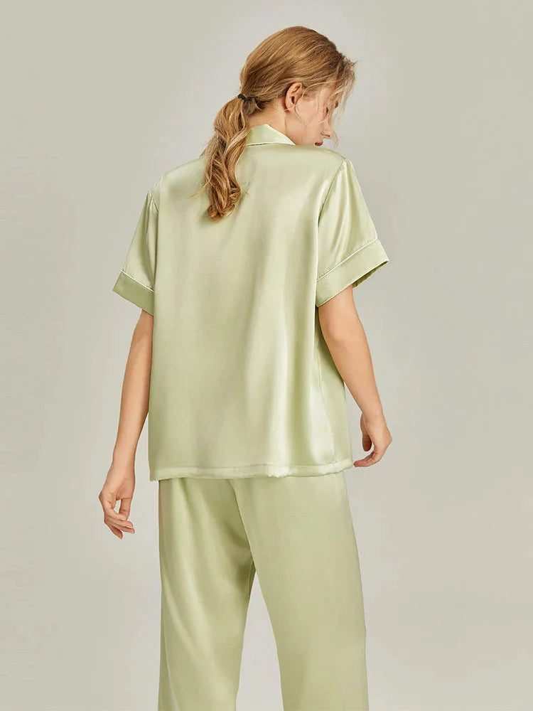 Pink silk women's short sleeve pajama set by Loran, soft and luxurious sleepwear for comfortable nights