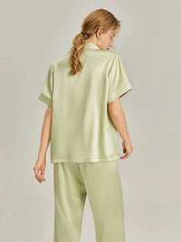 Pink silk women's short sleeve pajama set by Loran, soft and luxurious sleepwear for comfortable nights