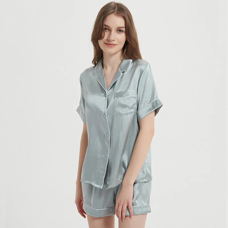 Women's pink silk pajama set by Loran featuring short sleeve sleepwear made from real silk, comfortable and elegant for sleep.