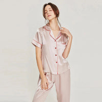 Women's pink silk pajama set by Loran featuring short sleeve sleepwear made from luxurious real silk fabric.