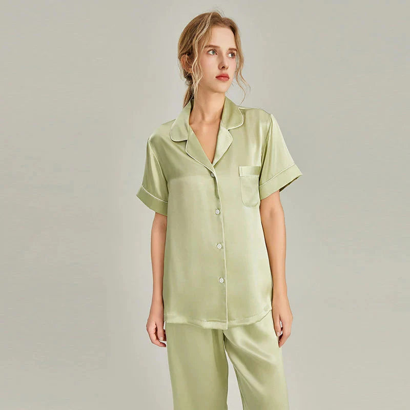 Women's pink silk pajamas set with short sleeves by Loran, featuring soft, luxurious real silk sleepwear for comfortable nights.