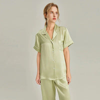 Women's pink silk pajamas set with short sleeves by Loran, featuring soft, luxurious real silk sleepwear for comfortable nights.