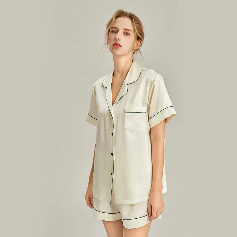 Women's pink silk pajamas set with short sleeves, featuring a luxurious real silk sleepwear design by Loran.