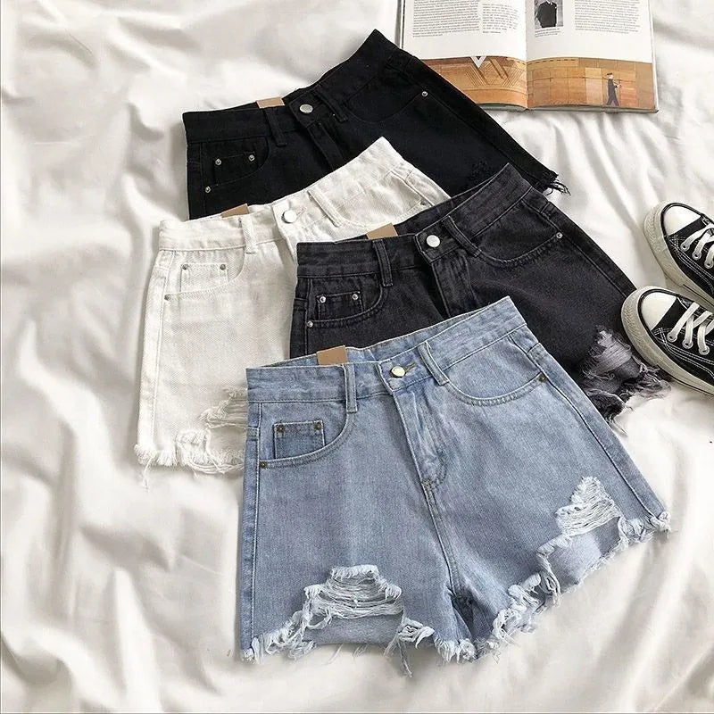 LORNEA Korean denim shorts for women, high waist, ripped, blue jeans with pockets and tassel details, perfect for summer streetwear.