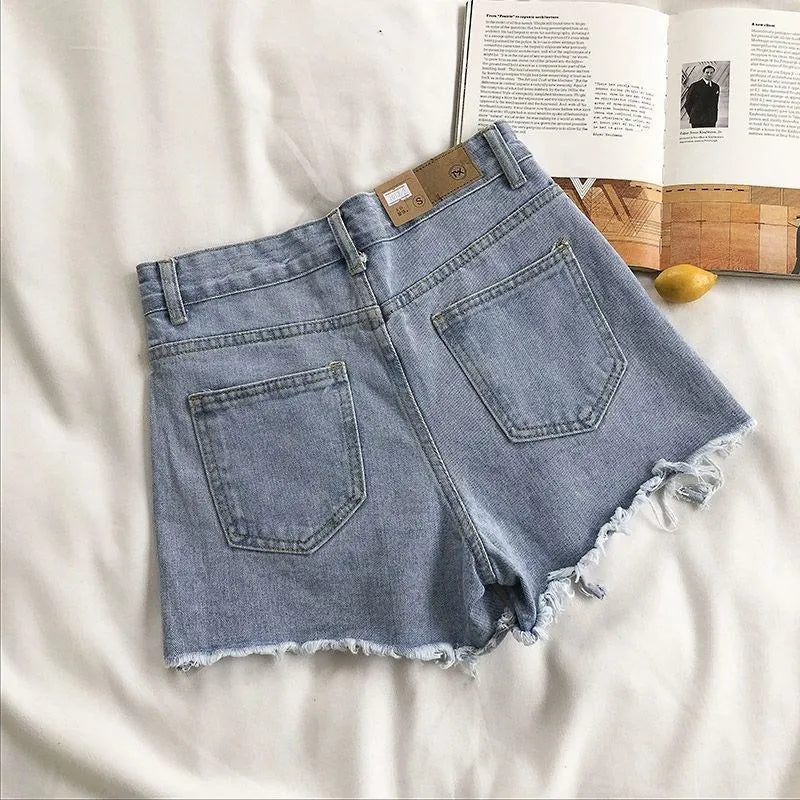 LORNEA Korean denim shorts for women, high waist ripped jeans with pockets and tassel details, perfect for summer streetwear.