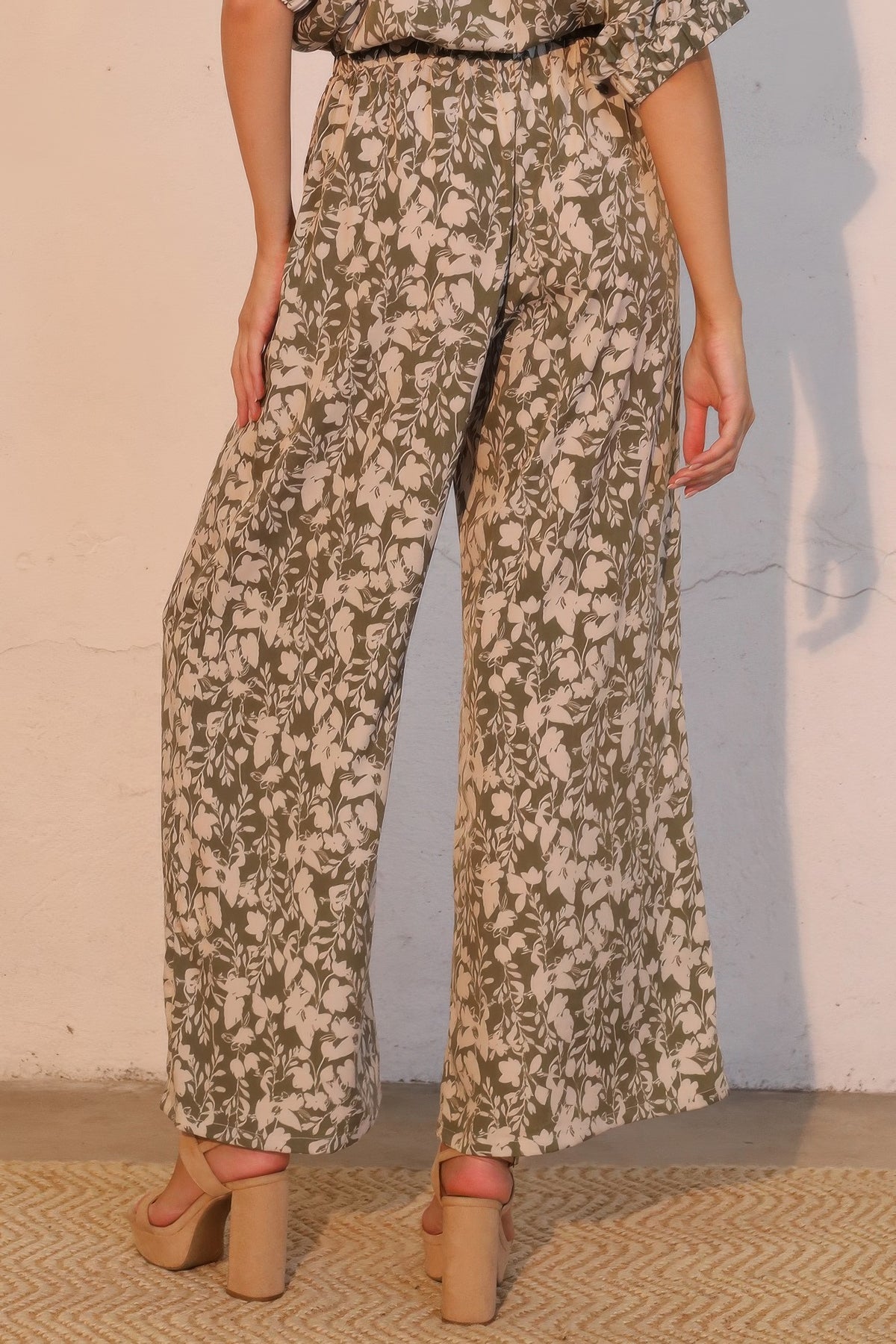 LORNEA Olive Vine Pocket Pants with side pockets and relaxed fit, made from comfortable fabric, shown in olive green.