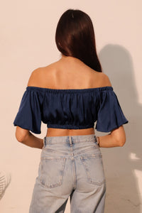 LORNEA washed poly silk bubble sleeve crop top in a soft, lightweight fabric with puffed sleeves and a fitted silhouette.