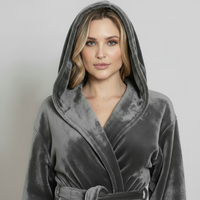 Women’s plush hooded robe by Lotus Linen in grey, cozy and spa-worthy for home relaxation.