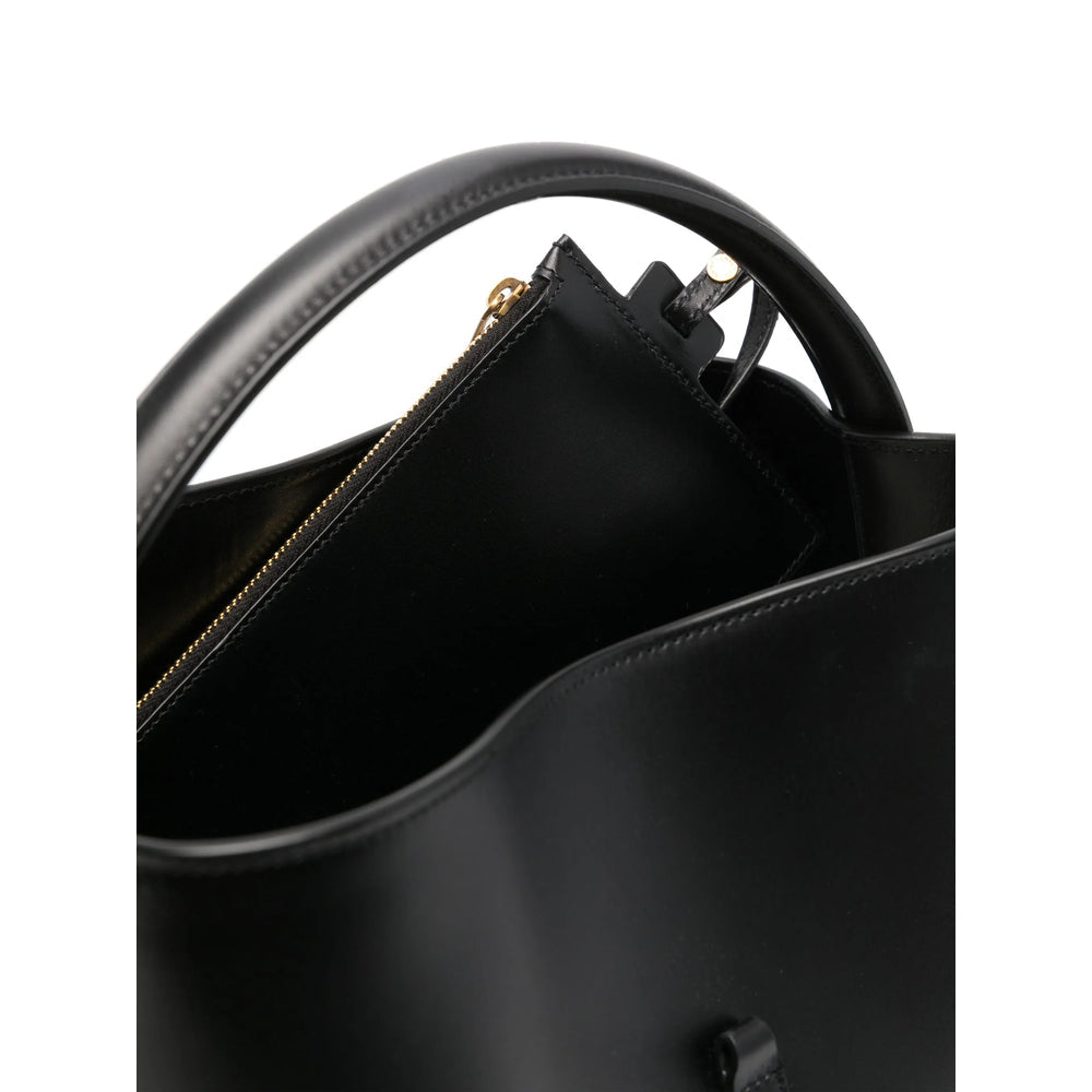 Luosophy black bucket handbag for women, stylish crossbody bag with sleek design, perfect for everyday use.