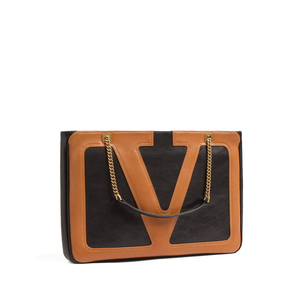 Luosophy black Valentino Garavani tote bag for women, stylish handbag with sleek design and spacious interior, suitable for everyday use.