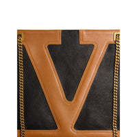 Luosophy black Valentino Garavani tote bag for women, large leather handbag with sleek design and top handles.
