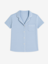 Light blue Donna short sleeve shirt by Lusome Sleep USA, casual denim mix fabric, relaxed fit, displayed on a flat lay with buttons