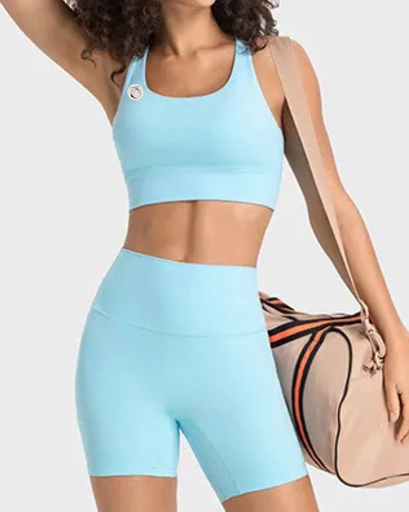 Manō Wear Pele sports bra in black with supportive fit, featuring adjustable straps and breathable fabric for active wear.