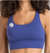 Manō Wear Pele sports bra in black with supportive design, featuring a snug fit and breathable fabric for active wear.