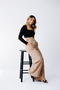 Margo Paige washable silk wide-leg pants featuring a relaxed fit, smooth fabric, and a high-rise waist for elegant comfort.