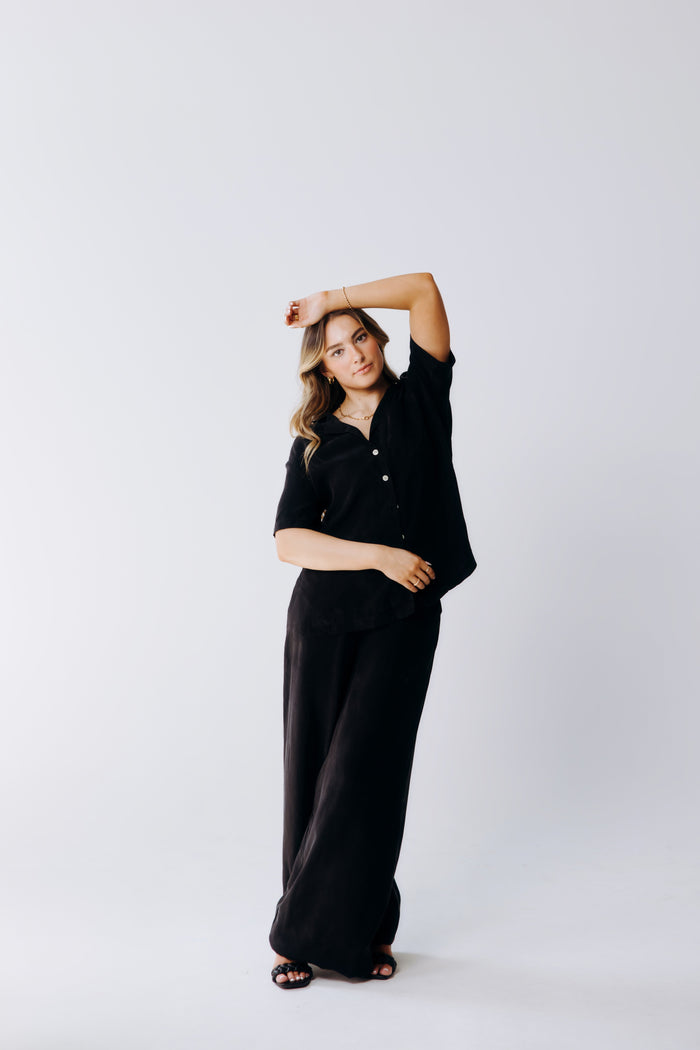 Light blue washable silk wide-leg pants by Margo Paige displayed on a model, highlighting the flowing, comfortable fit.