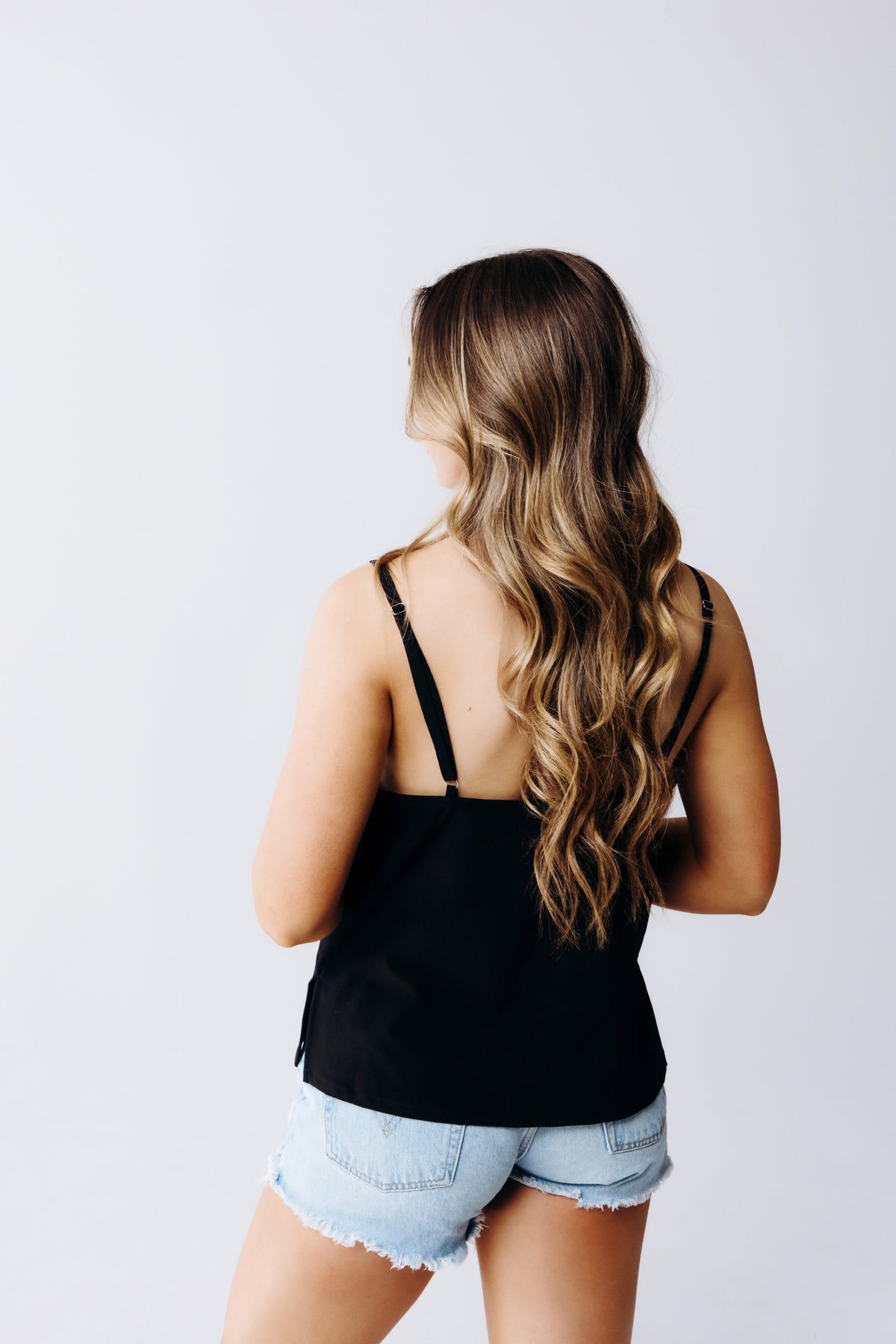 Margo Paige cowl neck camisole featuring a soft fabric and stylish cowl neckline, perfect for layered or standalone wear.