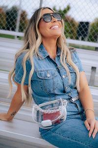 Margo Paige clear belt handbag with adjustable strap and spacious interior, stylish accessory for casual or trendy outfits.