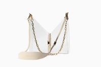 Taupe Margo Paige Cut-Out Crossbody handbag with sleek design and adjustable strap, perfect for everyday style.