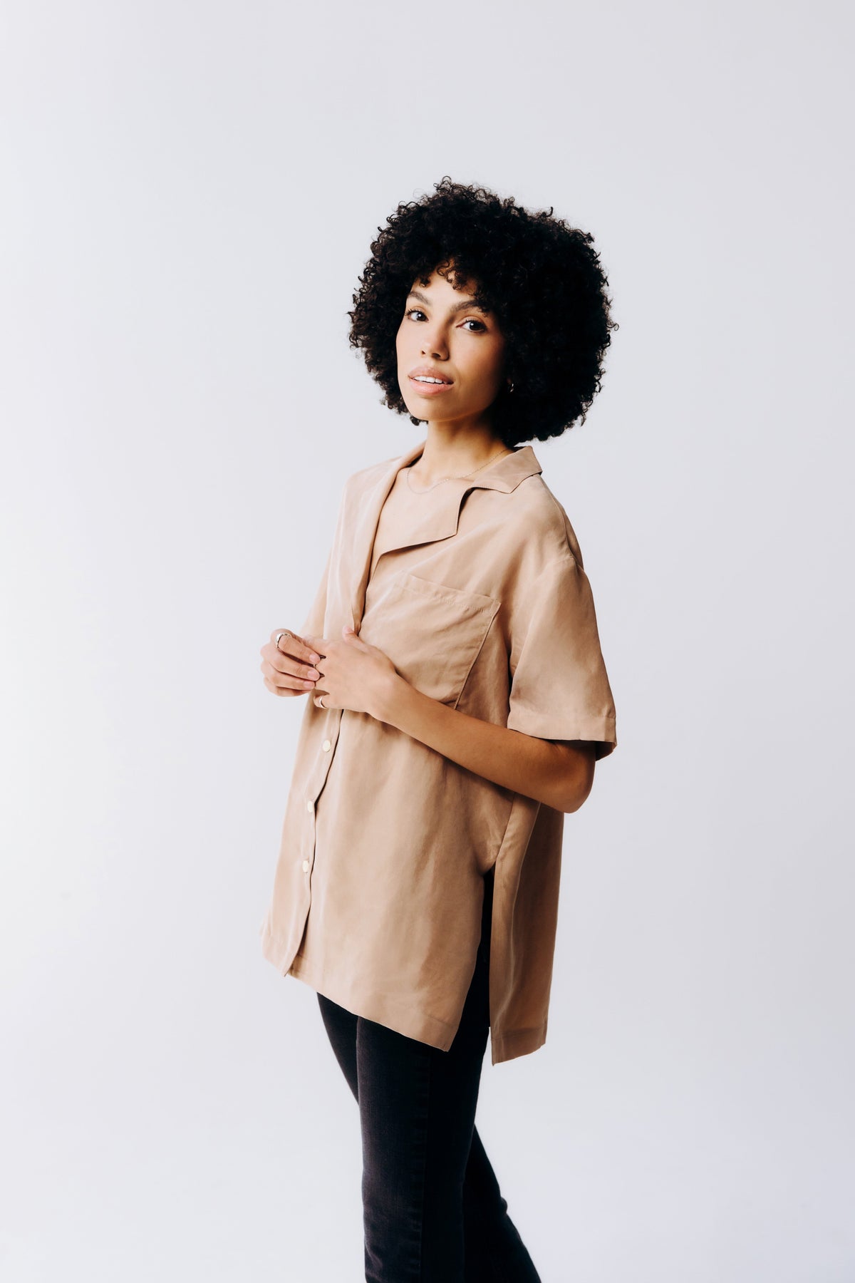 Margo Paige washable silk button-down shirt, soft and smooth, with classic collar and button front, shown on a hanger.