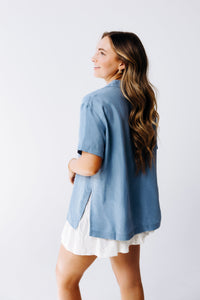 Margo Paige washable silk button-down shirt with long sleeves, classic collar, and chic design, displayed on a neutral background.