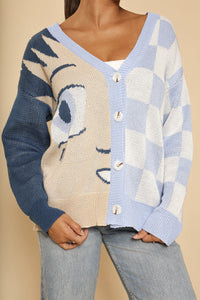 Anime checkered cardigan by Miss Sparkling featuring a stylish black and white checkered pattern and a cozy fit.