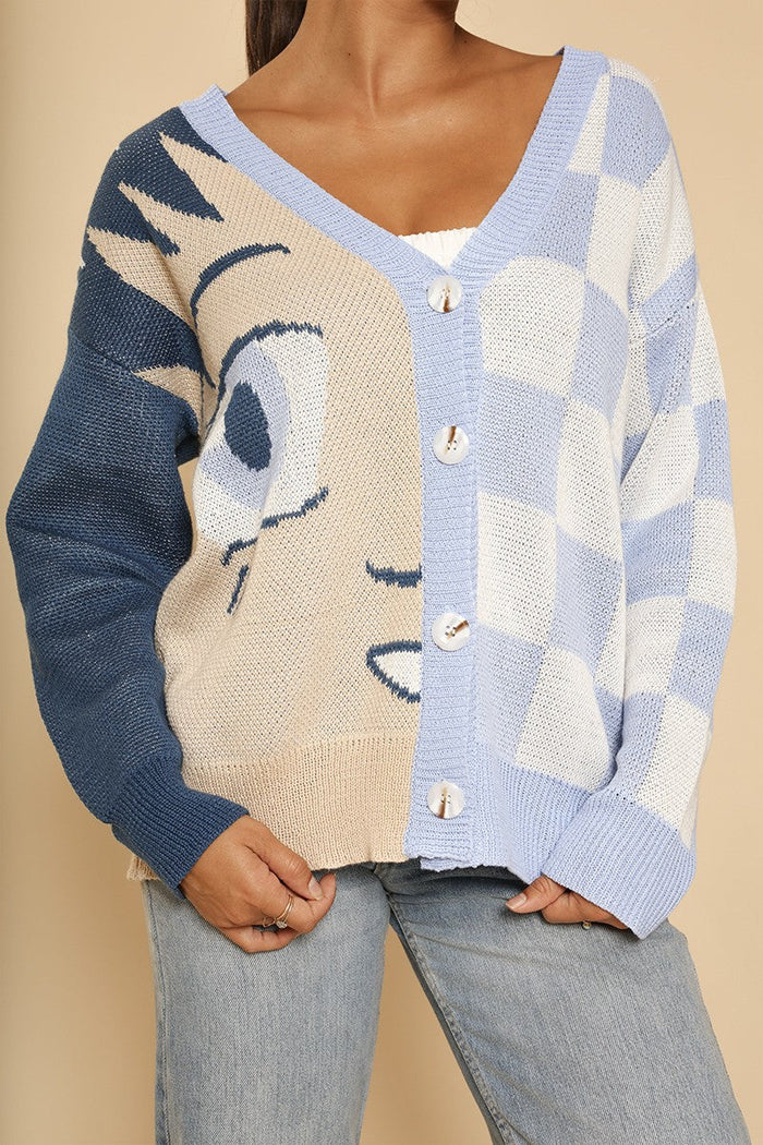 Anime checkered cardigan by Miss Sparkling featuring a stylish black and white checkered pattern and a cozy fit.