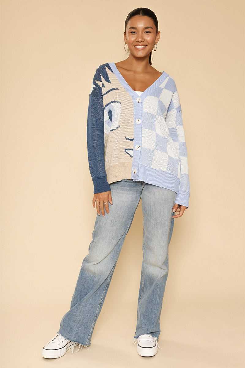 Anime checkered cardigan by Miss Sparkling featuring a black and white checkered pattern, long sleeves, and a cozy knit design.