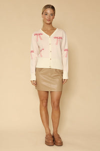 Miss Sparkling cropped knit bow cardigan with long sleeves and a bow detail, perfect for stylish layered looks.