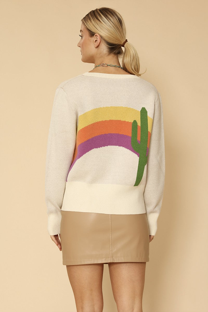 Miss Sparkling cactus rainbow knit cardigan displayed on a hanger, featuring colorful cactus and rainbow patterns in soft knit fabric.