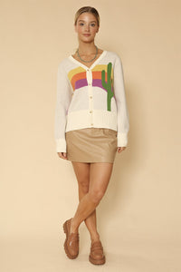 Miss Sparkling cactus rainbow knit cardigan with colorful striped pattern, button-up front, and cozy knit fabric.