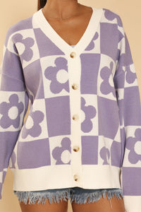 Checkered flower knit cardigan by Miss Sparkling featuring a cozy knit fabric and floral pattern in a stylish checkered design.