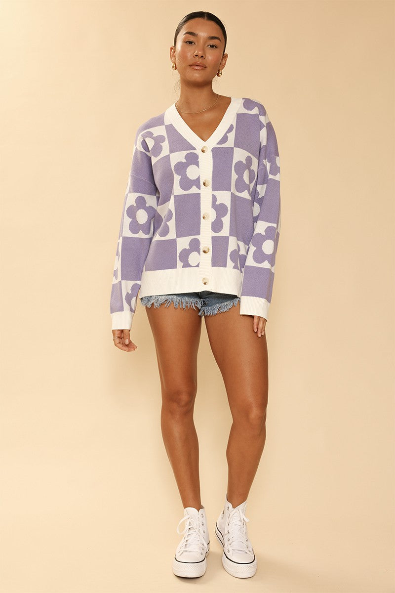 Checkered flower knit cardigan by Miss Sparkling featuring a colorful checkered pattern and floral knit design.