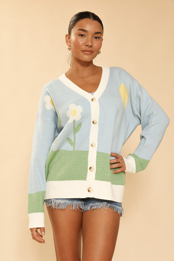 Miss Sparkling Flower Field knit cardigan with colorful floral pattern, long sleeves, and button front on a light background.