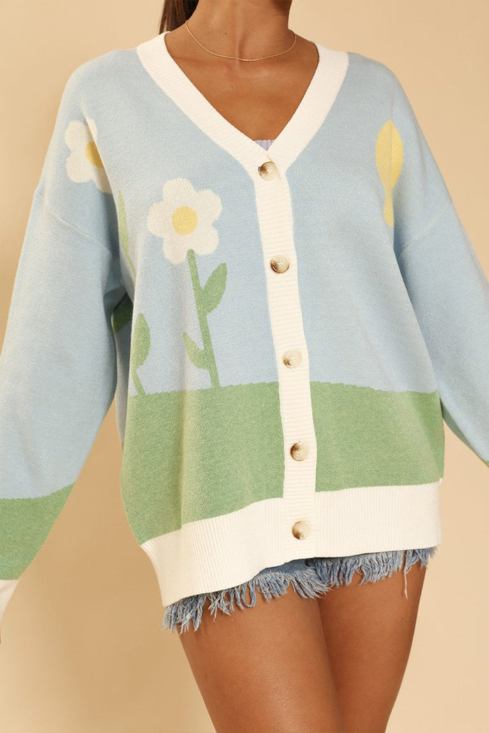 Miss Sparkling flower field knit cardigan with a floral pattern, button-up front, and cozy knit texture.