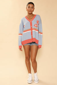 Miss Sparkling mushroom cardigan featuring a cozy knit design with mushroom patterns and button front detail.