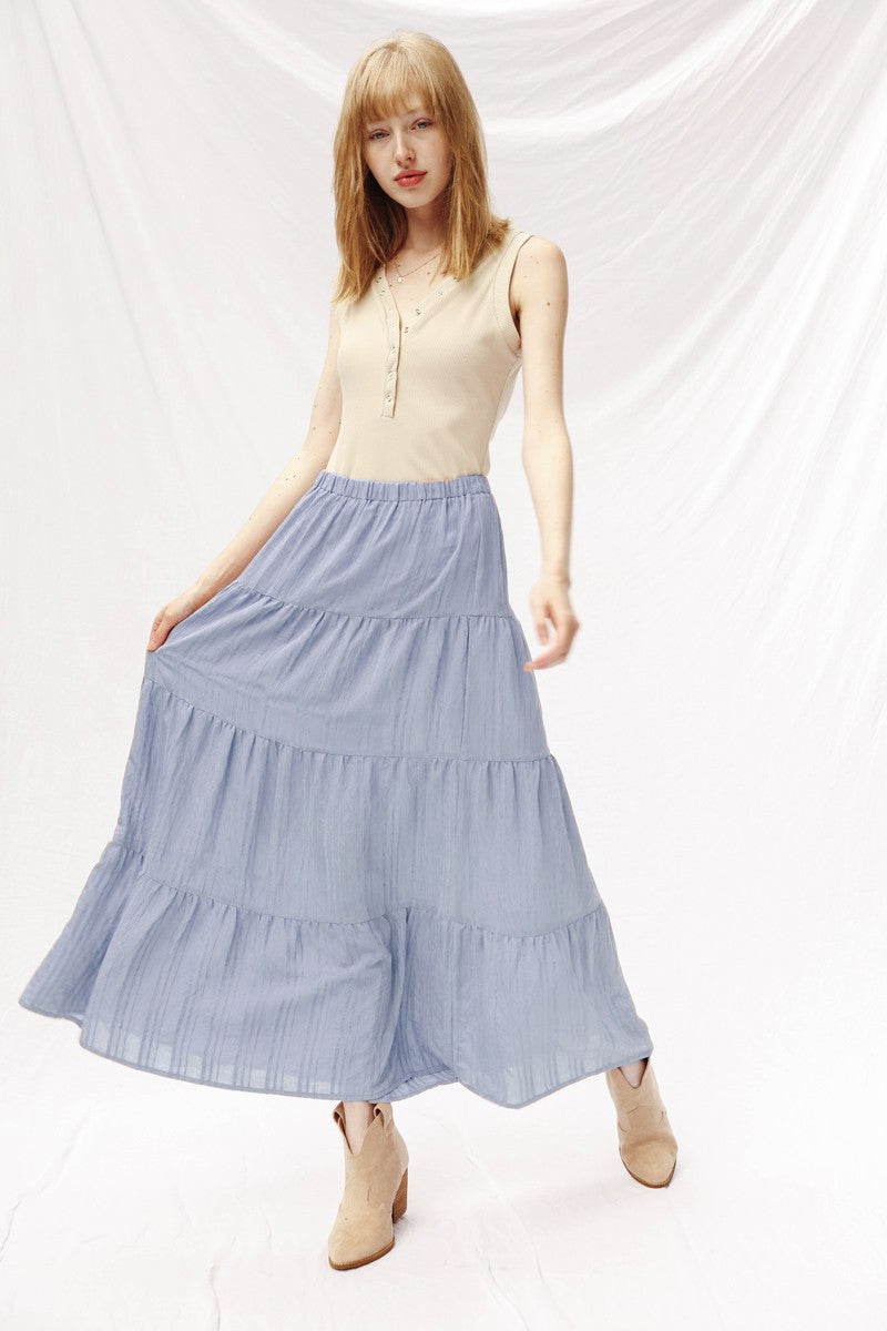 Miss Sparkling Prairie Maxi Skirt in flowy fabric with floral pattern and high-waisted design, perfect for casual or bohemian outfits.