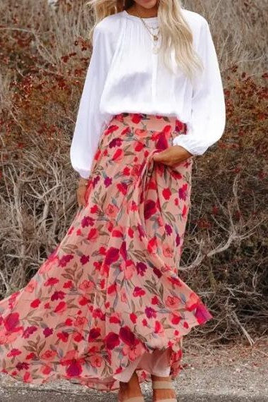 Pink Miss Sparkling floral maxi skirt with a flowing, lightweight fabric and a comfortable elastic waistband.