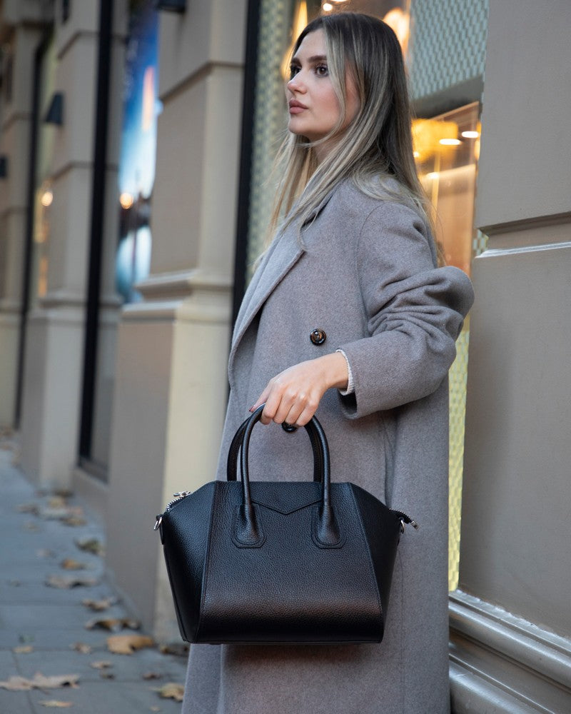 Black Mizuri Leather Lorenza Women's Bag, medium-sized leather handbag with stylish design and adjustable strap.