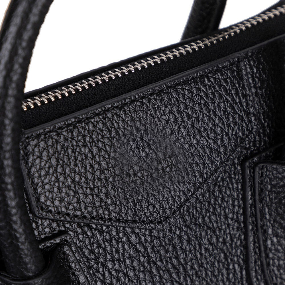 Black Lorenza leather women's bag by Mizuri Leather, medium-sized with stylish design and adjustable strap.