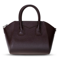 Black Mizuri Leather Lorenza women's medium leather bag with double handles and sleek design.