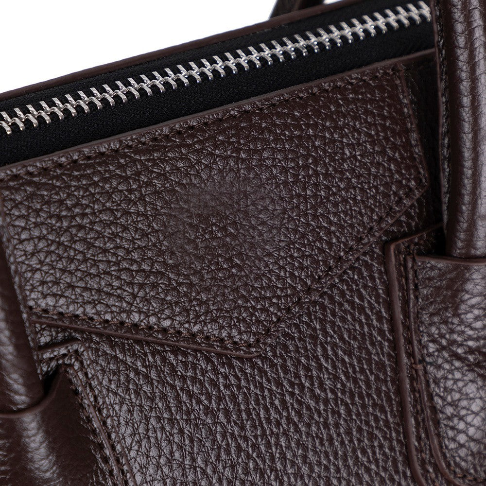 Black Mizuri Leather Lorenza Women's Bag, medium-sized leather handbag with sleek design and top handle for everyday use.