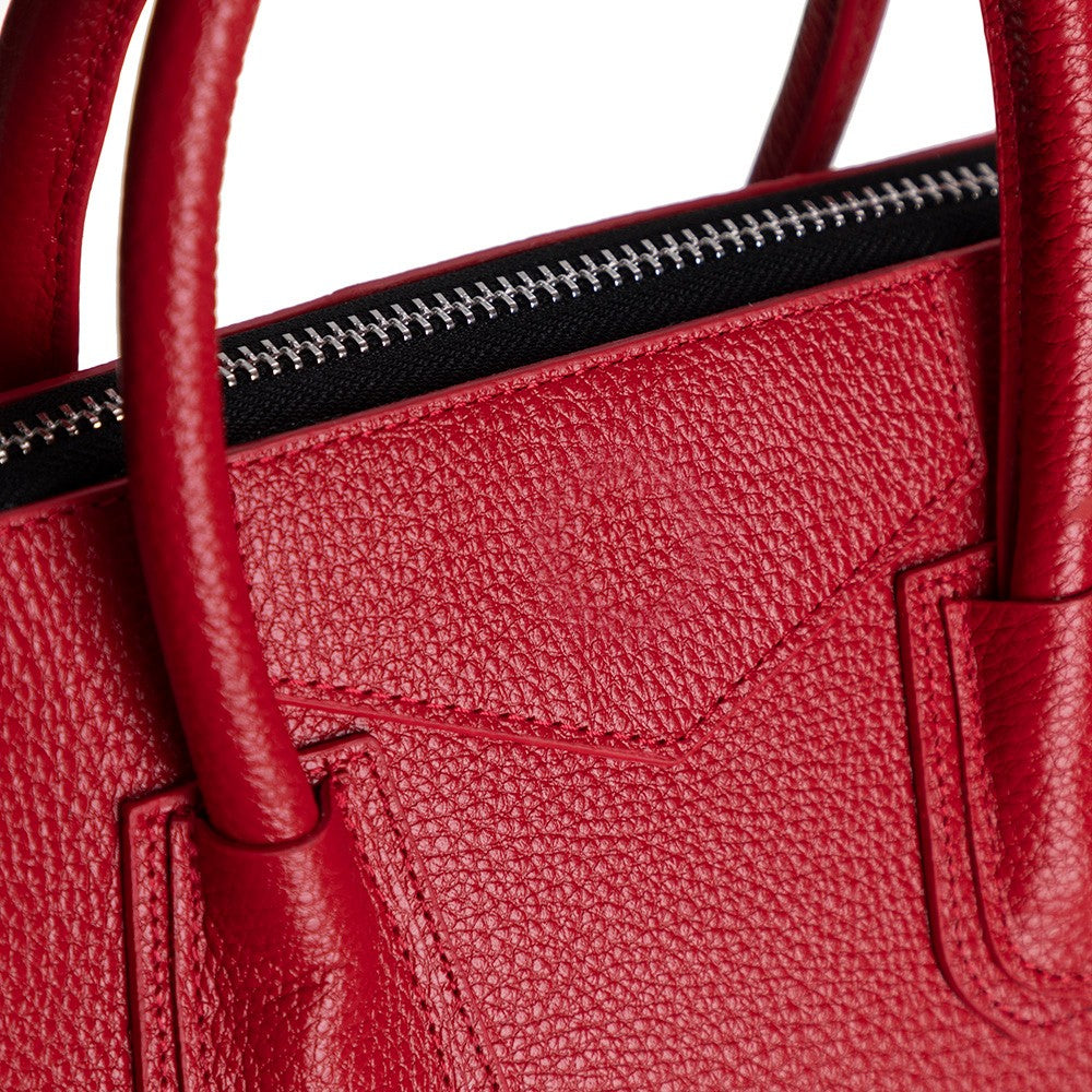Black Mizuri Leather Lorenza Women's Bag in medium size, stylish leather handbag with elegant design and sturdy handles.